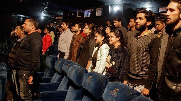 India apprehends 20 for not standing during national anthem