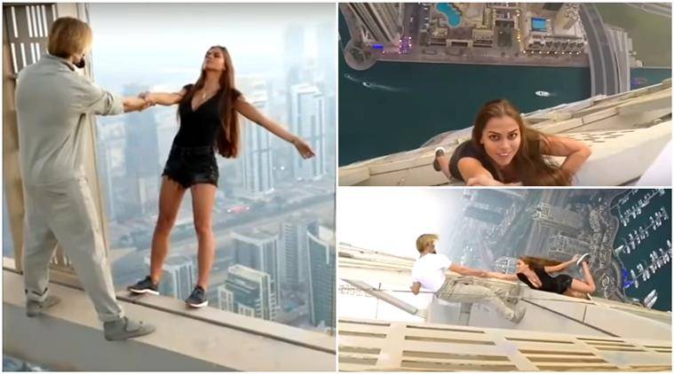 Video: Russian model hanging down from Dubai skyscraper just to click selfie