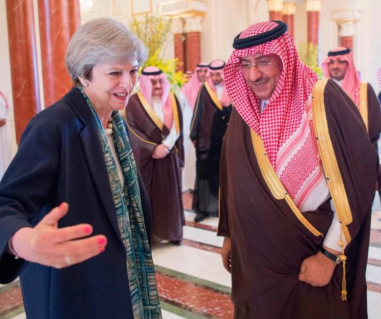 UK PM May refuses to wear headscarf during meeting with Saudi Crown Prince