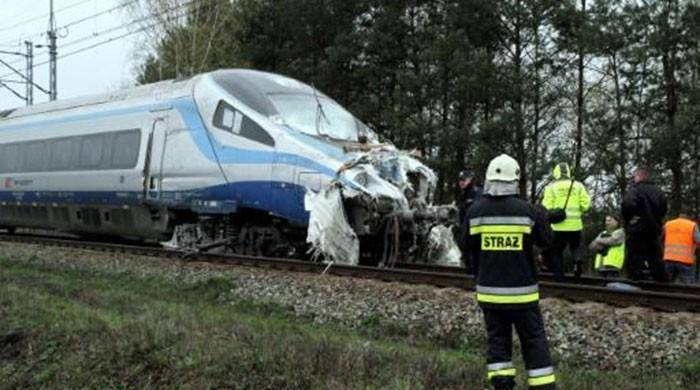 18 injured as train ploughs into lorry in Poland