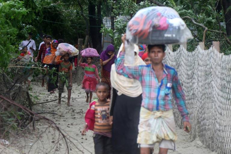 Five dead, hundreds of thousands flee as Cyclone Mora hits Bangladesh