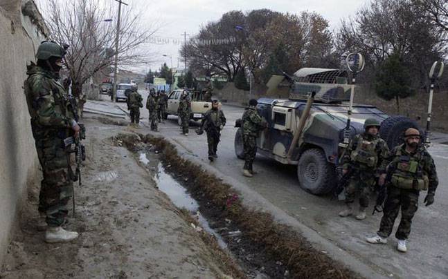 Attack on Afghanistan police headquarters leaves dozens dead, wounded