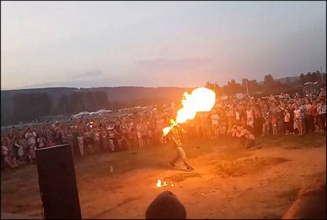 Watch: fire breather sets his face alight during performance