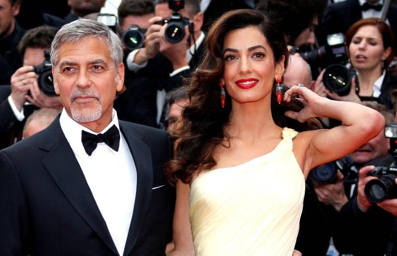 Clooney vows to sue French magazine over twins’ photos