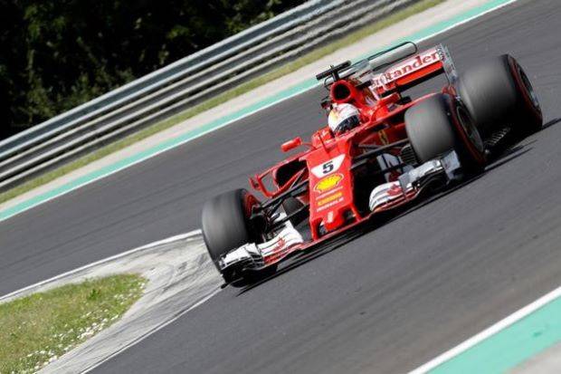 Motor racing: Vettel denies Hamilton a record-equalling pole