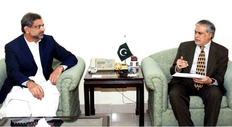 Shahid Khaqan Abbasi sacks Ishaq Dar, takes charge as ECC chairman