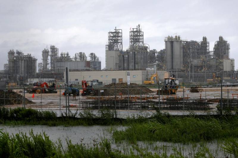 Crude dips, gasoline spikes as floods knock out almost a quarter of U.S. refineries
