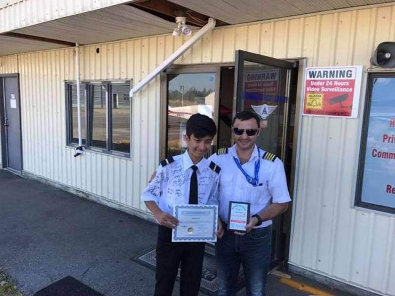 Look! 14 year old flies plane, sets world record