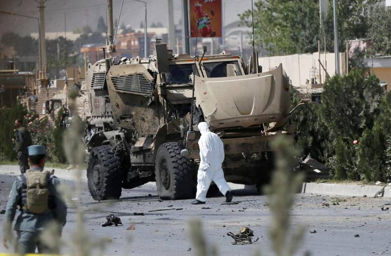 Car bomber hits NATO convoy in Afghanistan, civilians wounded