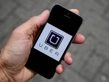 Uber suspends unlicensed service in change of tack