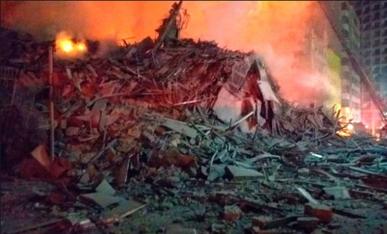 1 dead, 3 missing as blazing building collapses in Brazil