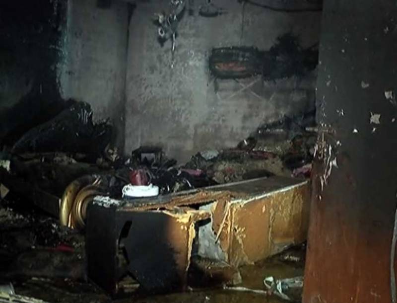 8 burnt to death as woman sets house on fire