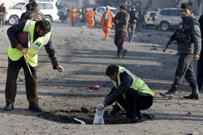 Afghan suicide bomber kills 12, injures dozens