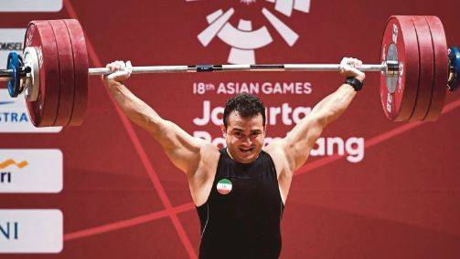 Iran's Sohrab Moradi breaks weightlifting's longest standing world record