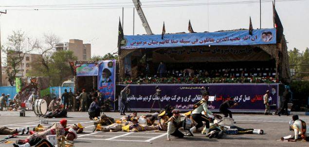 24 killed in gun attack on military parade in Iran